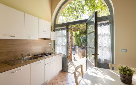 Casa Stella Serena, Podere le Scopaie, Pool: Interior Design, Flooring, Kitchen, Floor, Countertop, Ceiling, Kitchen Appliance, Major Appliance, Kitchen & Dining Room Table, Wood Stain