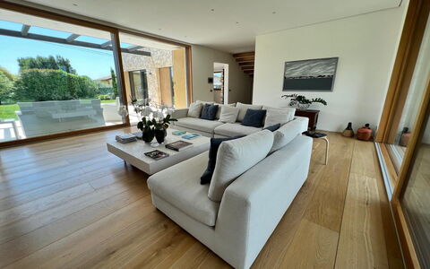 Villa Elena: Furniture, Flooring, Interior Design, Couch, Floor, Living Room, Wood Flooring, Wood, Home, Table