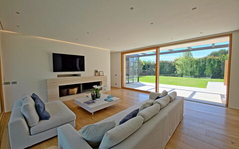 Villa Elena: Flooring, Floor, Interior Design, Wood, Couch, Living Room, Ceiling, Wood Flooring, Room