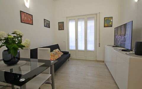 Il Centro: Furniture, Flooring, Interior Design, Floor, Wood, Couch, Room, Living Room, Lighting, Home