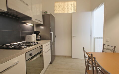 Il Centro: Kitchen Appliance, Kitchen, Countertop, Major Appliance, Flooring, Interior Design, Furniture, Wood, Floor, Cabinetry