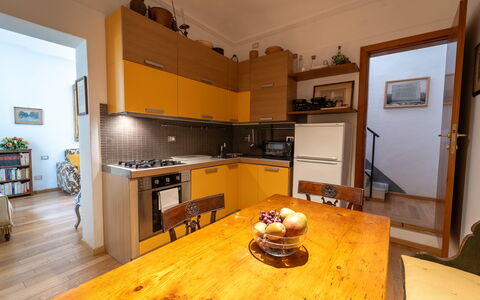 Casa dello Scrittore: Kitchen, Interior Design, Kitchen Appliance, Furniture, Flooring, Countertop, Major Appliance, Wood, Room, Floor