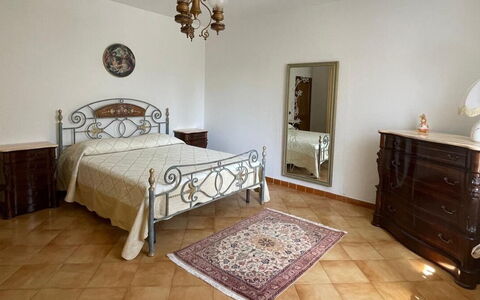 Villa i Fiori: Bed, Furniture, Bedroom, Interior Design, Bedding, Bed Sheet, Flooring, Floor, Room, Bed Frame