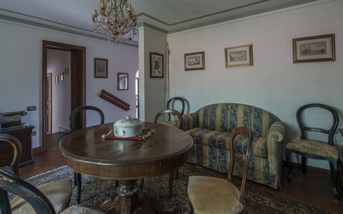 Villa Golly: Furniture, Interior Design, Flooring, Room, Picture Frame, Floor, Lighting, Ceiling, Table, Chair