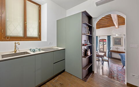 La Piazza Grand Vista Suite: Flooring, Interior Design, Wood, Kitchen, Countertop, Cabinetry, Furniture, Floor, Home, Kitchen Appliance