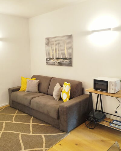 Lola Home - Levanto: Furniture, Interior Design, Flooring, Wall, Couch, Floor, Wood, Room, Ceiling, Living Room