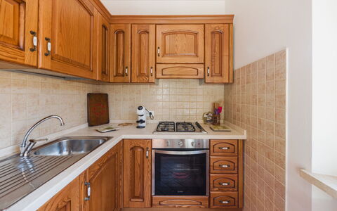 Dimora Polle di Malbacco: Kitchen, Countertop, Kitchen Appliance, Major Appliance, Cabinetry, Wood, Flooring, Interior Design, Furniture, Kitchen Sink
