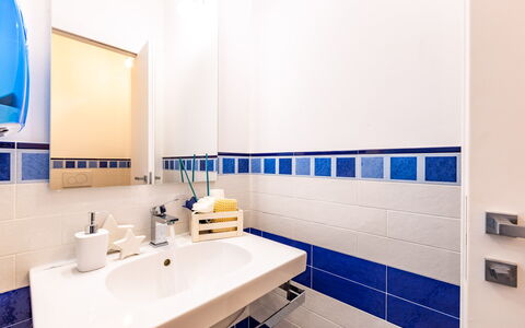 Il Nocciolo 12: Blue, Flooring, Floor, Plumbing Fixture, Interior Design, Bathroom, Tile, Plumbing, Tap, Sink
