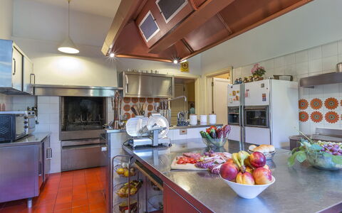 Villa Michelangelo 14: Kitchen, Countertop, Interior Design, Furniture, Ceiling, Lighting, Home, Major Appliance, Flooring, Light Fixture