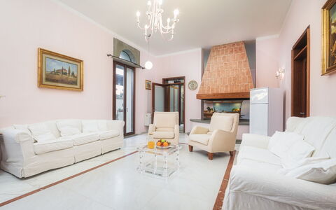 Villa Croci 12: Furniture, Interior Design, Flooring, Floor, Couch, Living Room, Ceiling, Room, Lighting, Table