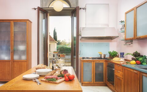 Villa Croci 12: Kitchen, Wood, Interior Design, Furniture, Kitchen Appliance, Countertop, Major Appliance, Flooring, Cabinetry, Home