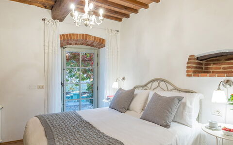 Torre Ginestre 12: Wall, Furniture, Interior Design, Bedroom, Home, Bed, Ceiling, Bedding, Linens, Bed Sheet