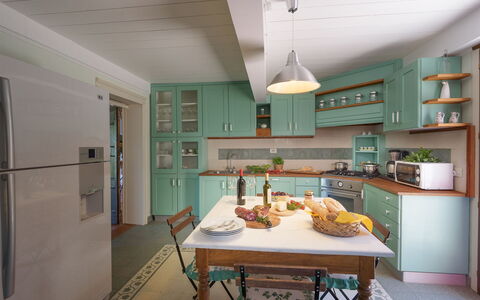 Villa la Poiana 10: Furniture, Cabinetry, Kitchen, Interior Design, Flooring, Wood, Countertop, Kitchen Appliance, Ceiling, Drawer