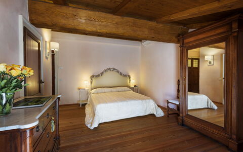 Villa la Poiana 10: Interior Design, Furniture, Wood, Flooring, Ceiling, Floor, Room, Bed, Bedroom, Lighting