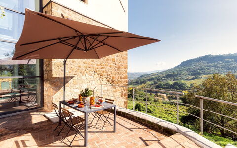 Podere Torre delle Sorgenti 4: Furniture, Outdoor Furniture, Umbrella, Chair, Outdoor Table, Shade, Balcony, Kitchen & Dining Room Table, Flowerpot, Eco Hotel