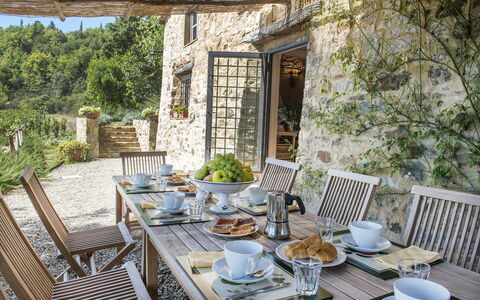 Villa delle Upupe 8: Furniture, Table, Outdoor Furniture, Chair, Kitchen & Dining Room Table, Tableware, Outdoor Table, Restaurant, Serveware, Dining Room