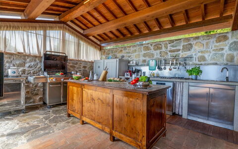 Antiche Pietre 10: Kitchen, Wood, Countertop, Furniture, Flooring, Cabinetry, Home, Kitchen Appliance, Tile, Major Appliance