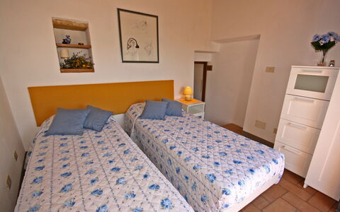 Monterzi 4: Bed, Bedroom, Furniture, Bedding, Wall, Bed Sheet, Wood, Floor, Flooring, Room
