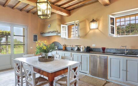 Villa Il Meluccio 12: Furniture, Interior Design, Kitchen, Wall, Flooring, Home, Cabinetry, Wood, Floor, Ceiling