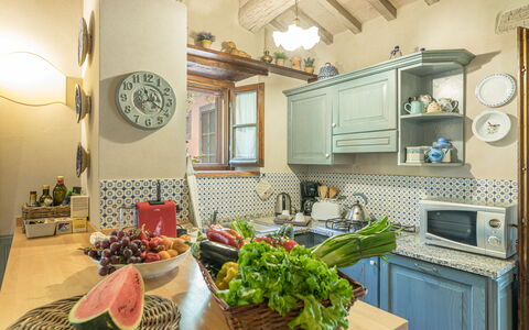 La Capannina 2+2: Furniture, Interior Design, Kitchen, Wood, Countertop, Room, Flooring, Ceiling, Lighting, Cabinetry