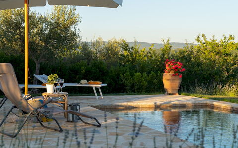 Country House Lo Spigo 4: Furniture, Outdoor Furniture, Umbrella, Chair, Swimming Pool, Shade, Sunlounger, Garden, Outdoor Table, Flowerpot