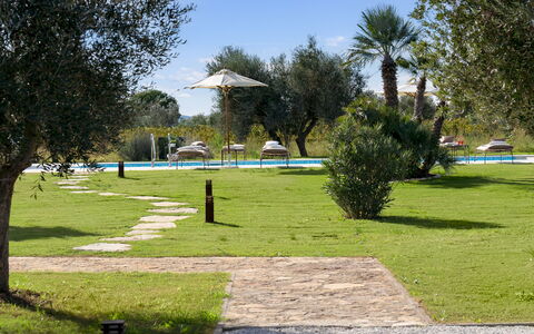 La Buganvilla 14: Tree, Lawn, Garden, Shade, Outdoor Furniture, Park, Landscaping, Swimming Pool, Leisure, Yard