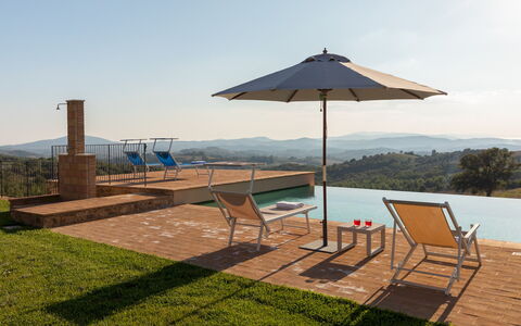 Casale Grottini 8: Furniture, Outdoor Furniture, Swimming Pool, Chair, Shade, Sunlounger, Wood Stain, Resort, Hardwood, Wood Flooring