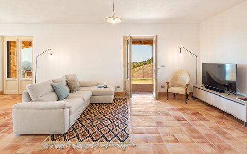 Casale Grottini 8: Flooring, Floor, Furniture, Living Room, Couch, Wood Flooring, Chair, Wood Stain, Hardwood