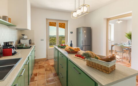 Casale Grottini 8: Furniture, Interior Design, Kitchen, Countertop, Cabinetry, Home, Chair, Flooring, Kitchen & Dining Room Table, Table