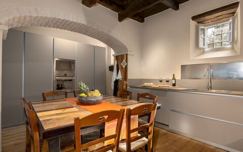 Villa la Rassinata 8: Furniture, Interior Design, Kitchen, Flooring, Countertop, Wood, Cabinetry, Kitchen Appliance, Ceiling, Home