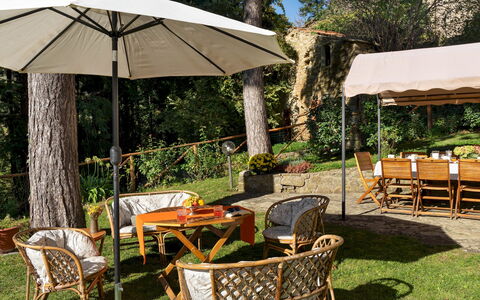 Villa la Rassinata 8: Furniture, Wood, Outdoor Furniture, Umbrella, Table, Outdoor Table, Chair, Shade, Garden, Outdoor Structure