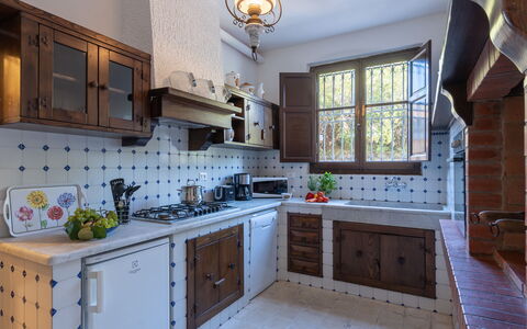Villa ai Venti 8: Kitchen, Countertop, Kitchen Stove, Flooring, Wood, Major Appliance, Interior Design, Furniture, Kitchen Appliance, Cabinetry
