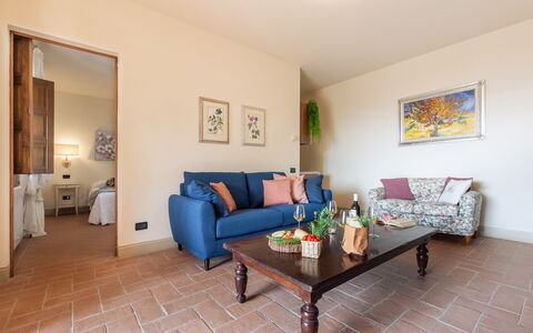 Casale Teatro 10: Furniture, Flooring, Interior Design, Wall, Couch, Floor, Wood, Living Room, Room, Table