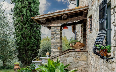 Casale delle Farfalle 12: Wall, Shrub, Home, Stone Wall, Cottage, Garden, Landscaping, Brick, Flowerpot, Estate
