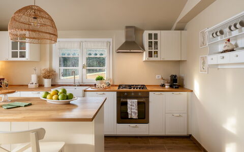 Villino Ariachiara 6: Furniture, Kitchen, Countertop, Cabinetry, Kitchen Appliance, Interior Design, Flooring, Wood, Light Fixture, Home Appliance