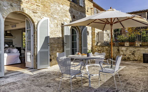 Podere Vernine di Sotto 14: Furniture, Chair, Outdoor Furniture, Table, Kitchen & Dining Room Table, Outdoor Table, Flowerpot, Houseplant, Patio, Balcony