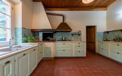 Sangiovese 14: Kitchen, Countertop, Interior Design, Cabinetry, Wood, Flooring, Kitchen Appliance, Ceiling, Room, Furniture