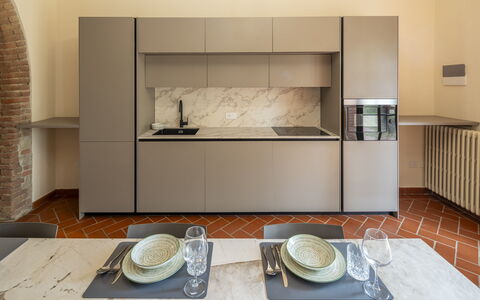 Casale le Lupe Apartments: Flooring, Kitchen, Interior Design, Kitchen Appliance, Countertop, Floor, Major Appliance, Cabinetry, Home Appliance, Apartment