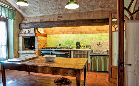 Villa Petrognano: Room, Furniture, Property, Countertop, Building, Interior Design, Kitchen, House, Beam, Ceiling