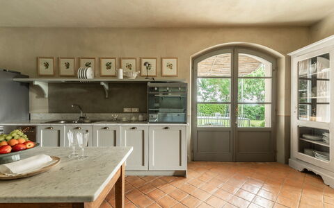 Villa Danilo: Countertop, Cabinetry, Furniture, Property, Kitchen Appliance, Kitchen Stove, Kitchen, Home Appliance, Wood, Interior Design