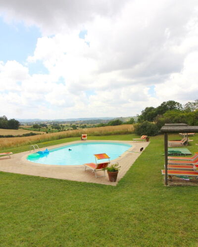 Santa Vittoria: Cloud, Sky, Plant, Tree, Swimming Pool, Land Lot, Shade, Grass, Outdoor Furniture, Cumulus