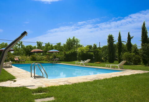 Pozzonovo: Blue, Swimming Pool, Outdoor Furniture, Leisure, Resort, Shade, Sunlounger, Garden, Eco Hotel, Landscaping