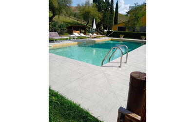 Villa Alabastro: Swimming Pool, Flooring, Flagstone, Composite Material, Shade, Garden, Tile, Water Feature, Concrete, Outdoor Furniture