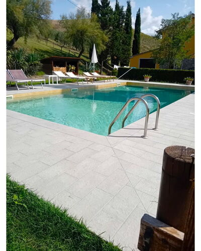 Villa Alabastro: Swimming Pool, Flooring, Flagstone, Composite Material, Shade, Garden, Tile, Water Feature, Concrete, Outdoor Furniture