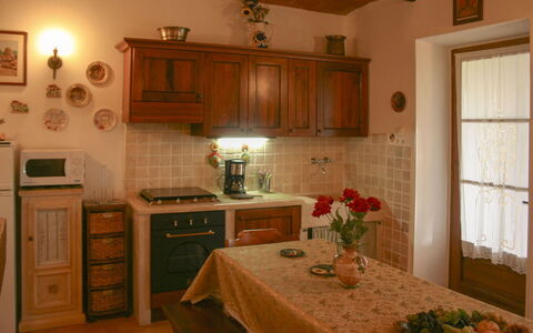 Country House Il Galleto: Furniture, Interior Design, Wood, Cabinetry, Kitchen, Kitchen Appliance, Flooring, Countertop, Light Fixture, Ceiling