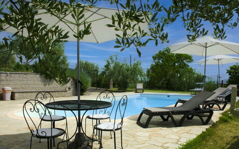La Rogaia: Umbrella, Furniture, Outdoor Furniture, Shade, Chair, Outdoor Table, Flowerpot, Swimming Pool, Design, Houseplant