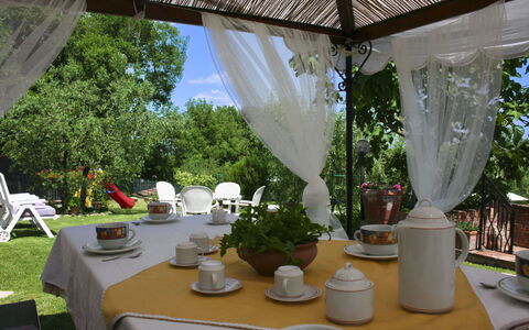 Podere San Bono: Furniture, Chair, Table, Tablecloth, Outdoor Furniture, Outdoor Table, Shade, Linens, Garden, Backyard