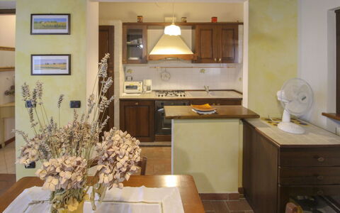 Villino Alba: Furniture, Interior Design, Countertop, Wood, Flooring, Kitchen, Kitchen Appliance, Ceiling, Room, Lighting