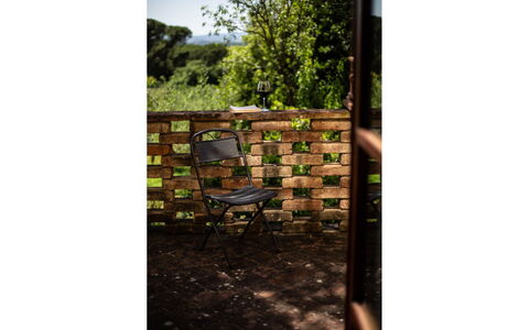 Villa degli Olivi: Plant, Furniture, Chair, Rectangle, Wood, Natural Landscape, Tree, Grass, Trunk, Font