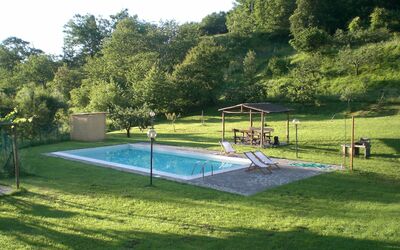 Casale Essenze: Property, Swimming Pool, Grass, Leisure, Sport Venue, House, Land Lot, Net, Backyard, Real Estate